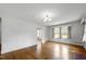 Spacious living area with hardwood floors and ample natural light at 2715 E Geer St, Durham, NC 27704