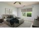 Cozy bedroom with a comfortable bed, soft lighting, and neutral decor, creating a serene and inviting atmosphere at 305 Wallington Ct, Mebane, NC 27302