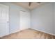 Bedroom includes double door closet, ceiling fan, light blue paint, beige carpeting and natural light at 305 Wallington Ct, Mebane, NC 27302