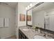 Bathroom boasting double sinks, a granite countertop, and a decorative mirror at 3215 Retama, New Hill, NC 27562