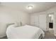 Bright bedroom with plush comforter, neutral paint, and carpet at 3215 Retama, New Hill, NC 27562