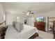 Bedroom showcasing neutral walls, carpet, and a glimpse into the walk-in closet at 3215 Retama, New Hill, NC 27562