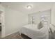 Bright bedroom with large windows, neutral paint, and plush comforter at 3215 Retama, New Hill, NC 27562