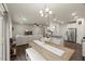 Open concept dining space featuring a full kitchen and comfortable living area at 3215 Retama, New Hill, NC 27562