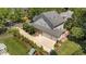 Aerial view of the house, showing the well manicured lawn and 3-car garage at 3306 Storybook Ln, Raleigh, NC 27614