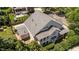 Aerial view of the home shows the roof, backyard, and mature trees surrounding the property at 3306 Storybook Ln, Raleigh, NC 27614