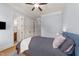 Comfortable bedroom with two closets, neutral paint, and hardwood floors at 3306 Storybook Ln, Raleigh, NC 27614