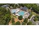 Aerial shot of community pool featuring pools, lounging areas, and recreational facilities at 3306 Storybook Ln, Raleigh, NC 27614