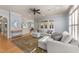 Expansive living room with seamless flow into the kitchen and dining areas, perfect for entertaining guests at 3306 Storybook Ln, Raleigh, NC 27614