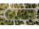 Aerial view of the neighborhood park showcasing walking paths, landscaping, and mature trees at 3306 Storybook Ln, Raleigh, NC 27614