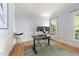 Bright and airy office space with hardwood floors, neutral walls, and natural light at 3306 Storybook Ln, Raleigh, NC 27614