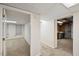 A basement hallway leading to multiple rooms at 3317 Harden Rd, Raleigh, NC 27607
