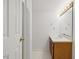 Bathroom with vanity showcasing a mirror, countertop, and tile flooring at 3317 Harden Rd, Raleigh, NC 27607