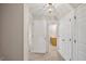 Hallway view with multiple doors to various rooms within the home at 3317 Harden Rd, Raleigh, NC 27607