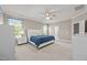 Spacious main bedroom featuring a ceiling fan, ensuite access, and neutral walls at 35 Clubhouse Dr, Youngsville, NC 27596