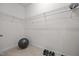 Bright walk-in closet with wire shelving, carpeting, and room for storage at 35 Clubhouse Dr, Youngsville, NC 27596