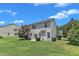 Spacious backyard view with green grass at 3604 Rivermist Dr, Raleigh, NC 27610