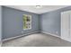 Bedroom with carpet, a window, and a closet at 3604 Rivermist Dr, Raleigh, NC 27610