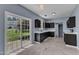 Eat-in kitchen features stainless appliances and sliding glass doors to backyard at 3604 Rivermist Dr, Raleigh, NC 27610