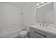 Clean bathroom with a shower and bathtub, plus modern fixtures at 37 Weeping Willow Ln, Lillington, NC 27546
