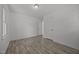 Bright, empty bedroom with open door to a closet at 37 Weeping Willow Ln, Lillington, NC 27546