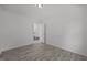 Neutral bedroom with a glimpse into the laundry room at 37 Weeping Willow Ln, Lillington, NC 27546