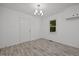 Dining room with new flooring and a stylish chandelier, ready for entertaining at 37 Weeping Willow Ln, Lillington, NC 27546