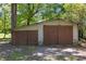 Outdoor shed on property features dual entrances and plenty of storage at 37 Weeping Willow Ln, Lillington, NC 27546