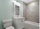 Clean bathroom with a tiled shower, modern vanity, and updated fixtures at 3934 Old Chapel Hill Rd, Durham, NC 27707