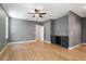 Bedroom with ceiling fan and natural light coming through the windows at 3934 Old Chapel Hill Rd, Durham, NC 27707