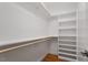 A walk-in closet featuring shelving and hanging rods at 3934 Old Chapel Hill Rd, Durham, NC 27707