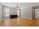 Spacious living room with hardwood floors and built-in cabinetry at 3934 Old Chapel Hill Rd, Durham, NC 27707