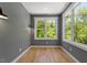 Bright office space with windows, natural light and hardwood floors at 3934 Old Chapel Hill Rd, Durham, NC 27707