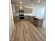 This modern kitchen offers stainless appliances, stylish countertops and neutral colors at 408 La Maison Ave # 3, Wendell, NC 27591