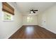 Spacious bedroom with multiple windows and updated flooring at 409 Glaive Dr, Durham, NC 27703