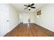 The primary bedroom leads to a private bath and has updated flooring at 409 Glaive Dr, Durham, NC 27703