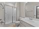 Modern bathroom with a glass-enclosed shower, vanity, and neutral color scheme at 417 Austin View Blvd, Wake Forest, NC 27587