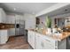 Gourmet kitchen featuring a center island, granite countertops, and stainless steel appliances at 417 Austin View Blvd, Wake Forest, NC 27587