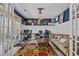 Spacious living room with stylish decor, ample seating, and access to outdoor area at 417 Austin View Blvd, Wake Forest, NC 27587