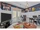 Cozy living area showcasing custom wall decor, ample lighting, and comfortable furnishings at 417 Austin View Blvd, Wake Forest, NC 27587
