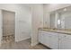 Bathroom featuring white cabinetry, granite countertops, and modern fixtures at 418 Ivy Bank Dr, Angier, NC 27501