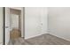 Bedroom with neutral walls, carpet, and white trim, offering a calming and versatile space at 418 Ivy Bank Dr, Angier, NC 27501