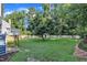 Private backyard with a shed and plenty of mature trees at 4309 Birmingham Way, Raleigh, NC 27604
