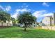 A lush backyard offers ample space for recreation, enhanced by mature trees and full fencing for privacy at 4309 Birmingham Way, Raleigh, NC 27604