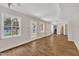 Spacious basement with walkout access and wood-look flooring at 4309 Birmingham Way, Raleigh, NC 27604