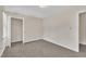 Bedroom featuring neutral walls, carpet flooring, and a closet at 4309 Birmingham Way, Raleigh, NC 27604
