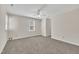 Spacious bedroom featuring neutral walls, carpet flooring, and a ceiling fan at 4309 Birmingham Way, Raleigh, NC 27604