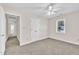 This bedroom offers a ceiling fan and lots of natural light at 4309 Birmingham Way, Raleigh, NC 27604