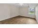 A bedroom with wood floors and a ceiling fan at 4309 Birmingham Way, Raleigh, NC 27604