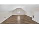 This bonus room offers wood-look floors and a window at 4309 Birmingham Way, Raleigh, NC 27604